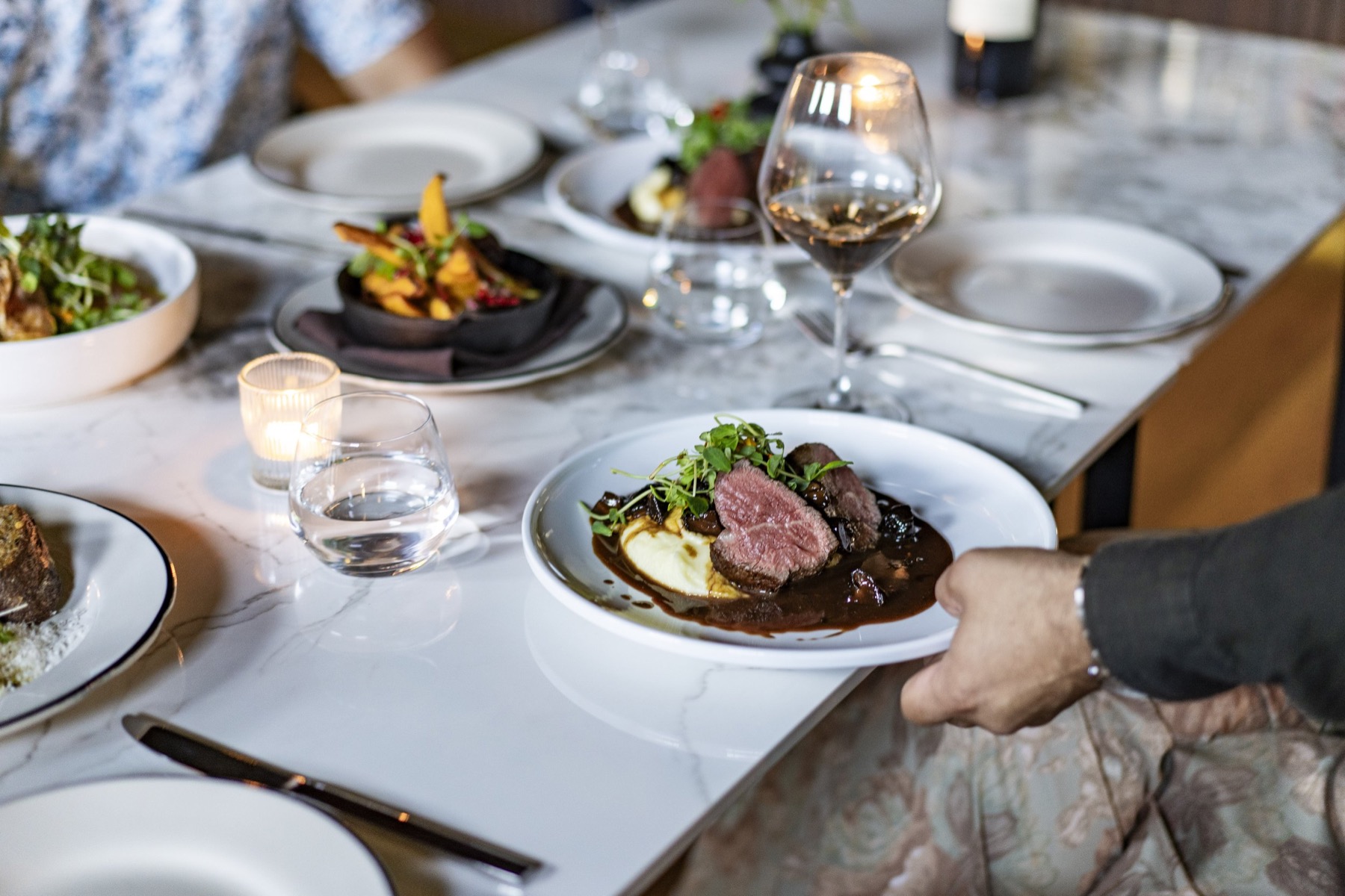 Dining that begins with candlelight.